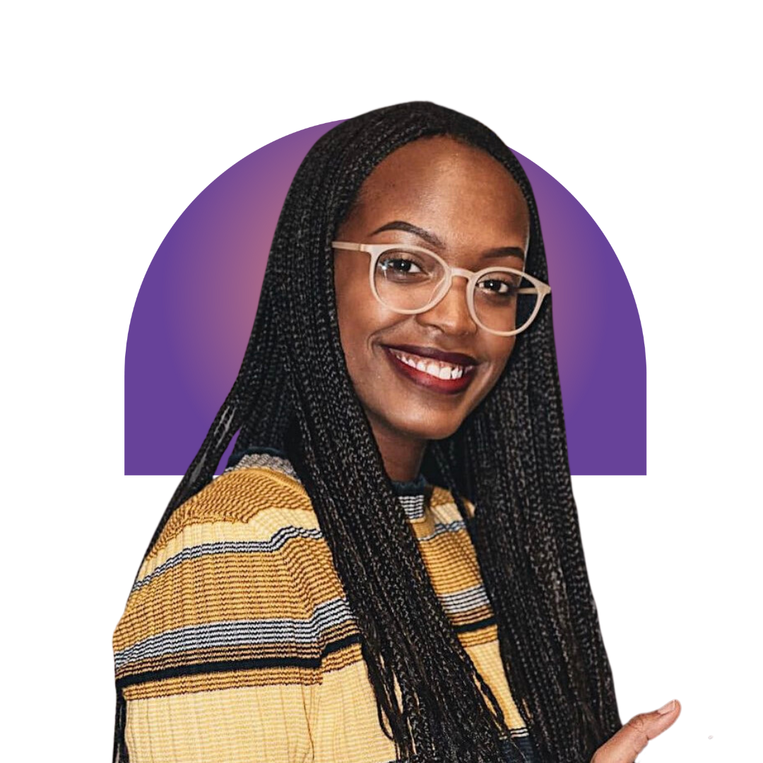 riley A smiling woman in a gray beanie hugging a black and white dog wearing a purple harness.
