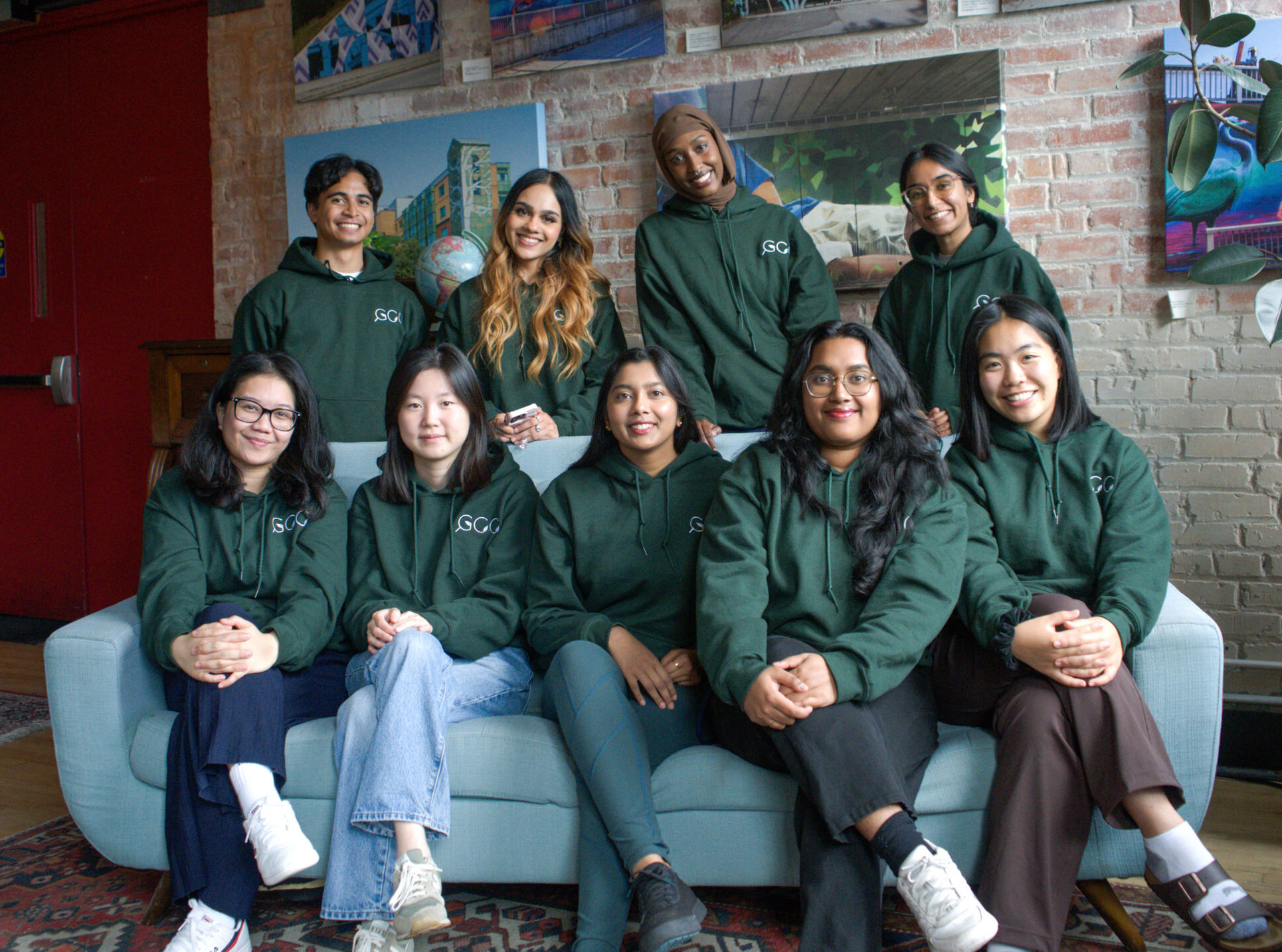 DSC02757 (1) A Green Career Centre team photo, all members wearing shades of green.